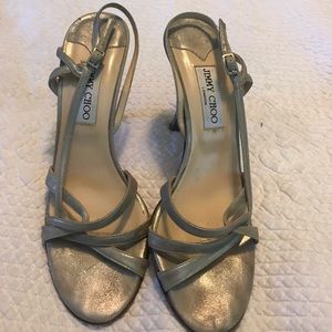 Strappy gold Jimmy Choos.